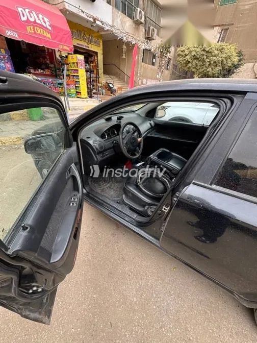 شيفروليه افيو 2013 أسود مستعملة للبيع - 9