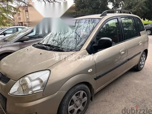 هيونداي ماتريكس 2010 ذهبي مستعملة للبيع - 1