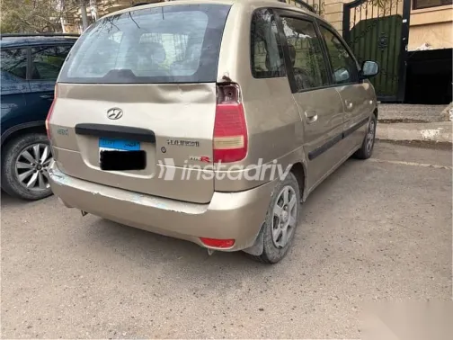 هيونداي ماتريكس 2010 ذهبي مستعملة للبيع - 4