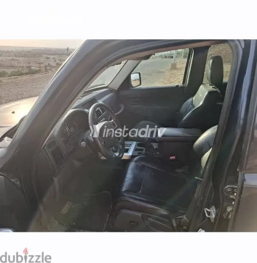 جيب شيروكي 2009 أزرق غامق مستعملة للبيع - 7