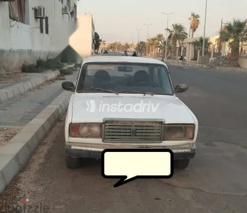 لادا 2107 2009 أبيض مستعملة للبيع - 1