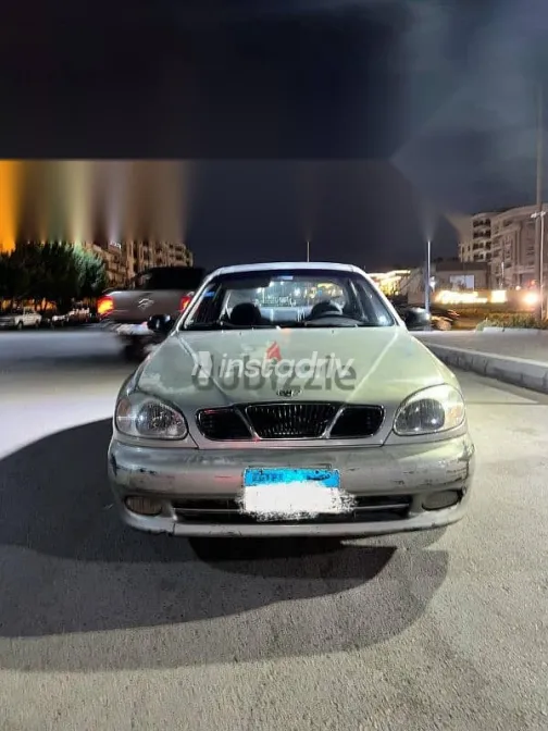 دايو لانوس 1999 فضي مستعملة للبيع - 1