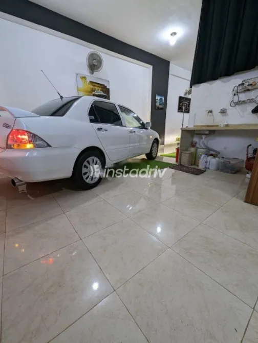 ميتسوبيشي لانسر 2014 أبيض مستعملة للبيع - 2