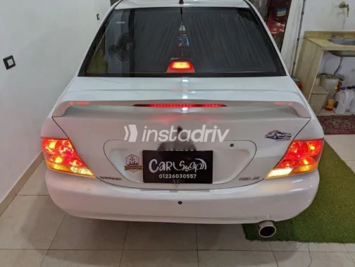 ميتسوبيشي لانسر 2014 أبيض مستعملة للبيع - 5