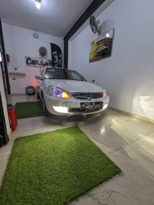 ميتسوبيشي لانسر 2014 أبيض مستعملة للبيع