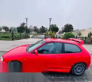 ميتسوبيشي كولت 1998 أحمر مستعملة للبيع