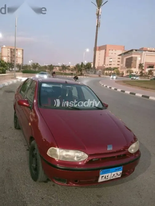 فيات سينا 2002 أحمر مستعملة للبيع - 2