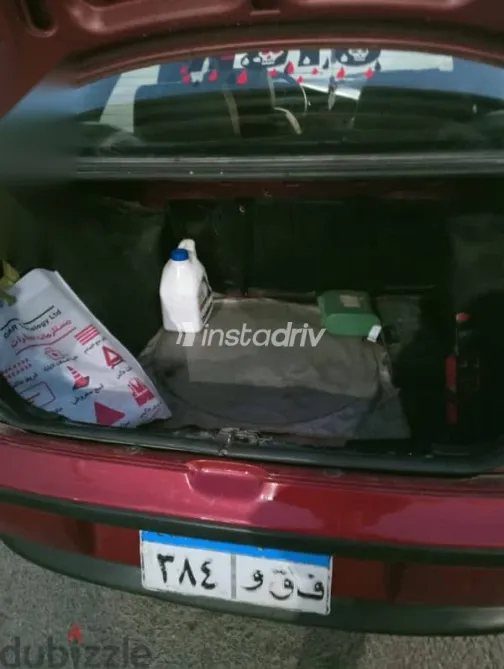 فيات سينا 2002 أحمر مستعملة للبيع - 7