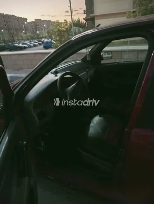 فيات سينا 2002 أحمر مستعملة للبيع - 9