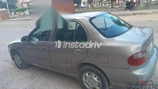 هيونداي اكسنت 2006 فضي مستعملة للبيع - 1