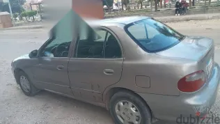 هيونداي اكسنت 2006 فضي مستعملة للبيع