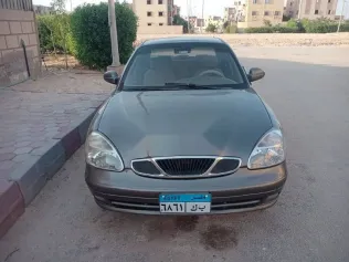 دايو نوبيرا 1999 ذهبي مستعملة للبيع