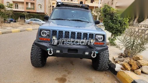 جيب شيروكي 1998 أزرق غامق مستعملة للبيع - 1