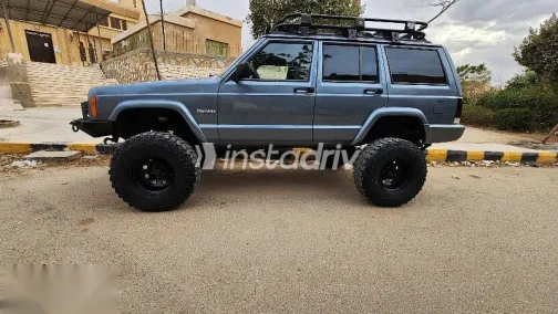 جيب شيروكي 1998 أزرق غامق مستعملة للبيع - 3