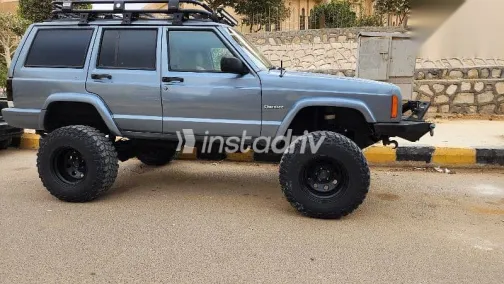 جيب شيروكي 1998 أزرق غامق مستعملة للبيع - 9