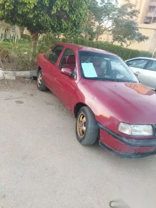 اوبل فيكترا 1994 أحمر مستعملة للبيع