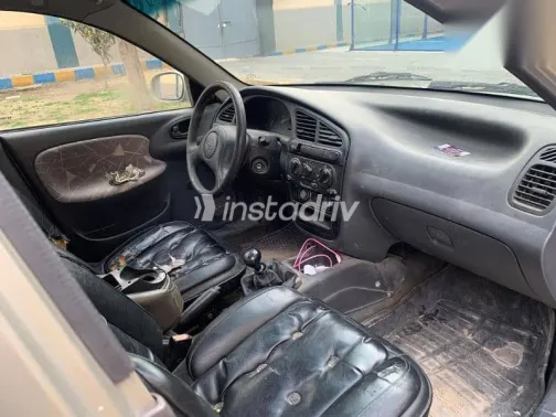 دايو لانوس 1999 ذهبي مستعملة للبيع - 6