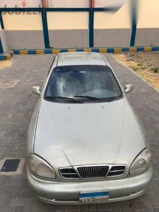 دايو لانوس 1999 ذهبي مستعملة للبيع