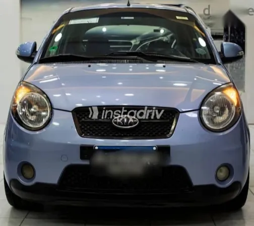 كيا بيكانتو 2010 أزرق غامق مستعملة للبيع - 1