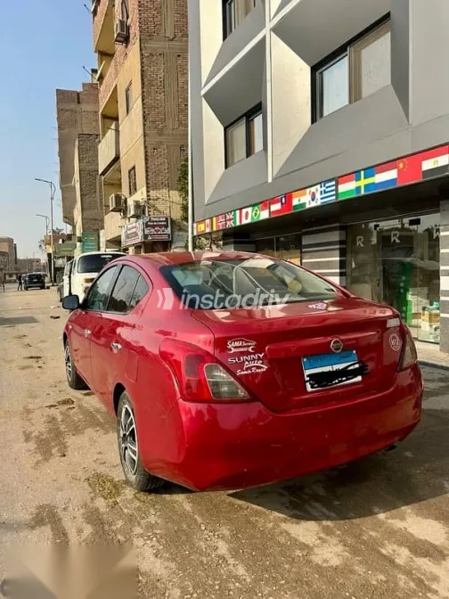 نيسان صنى 2014 أحمر مستعملة للبيع - 6