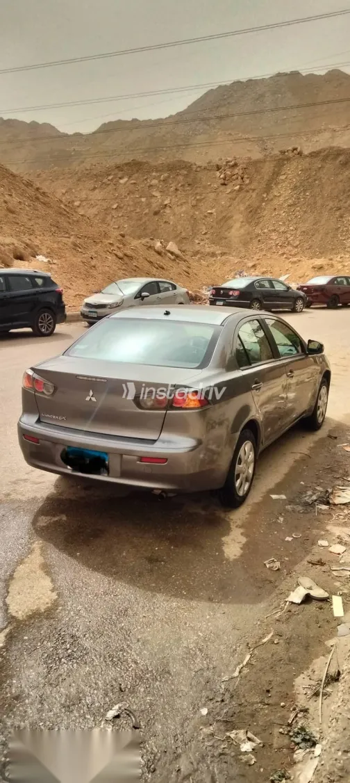 ميتسوبيشي لانسر 2017 رمادي مستعملة للبيع - 5