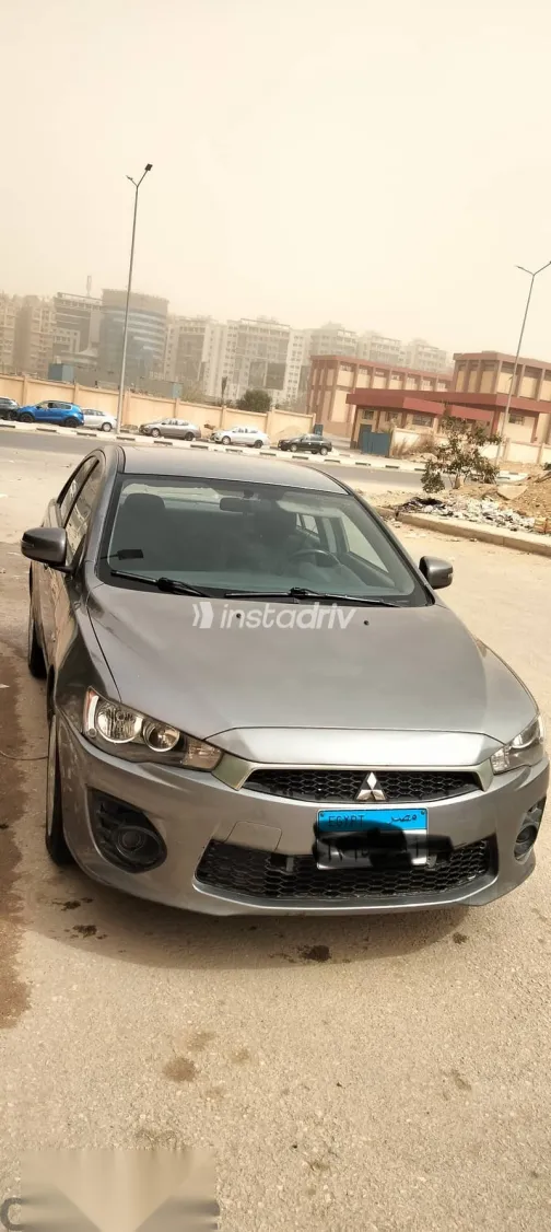 ميتسوبيشي لانسر 2017 رمادي مستعملة للبيع - 9