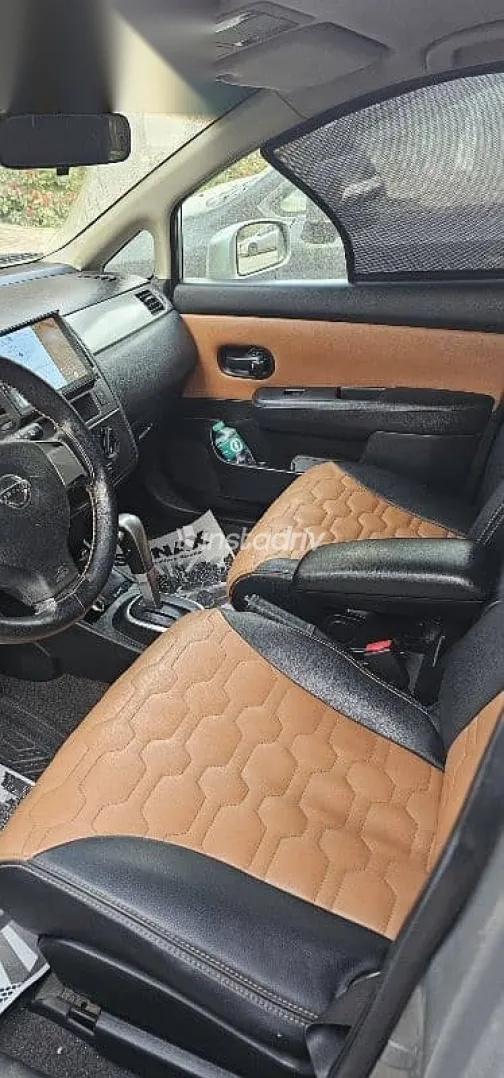 نيسان تيدا 2006 فضي مستعملة للبيع - 5