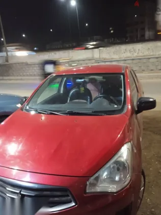 ميتسوبيشي اتراج 2014 أحمر مستعملة للبيع