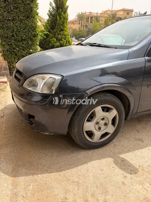 اوبل كورسا 2006 أبيض مستعملة للبيع - 1