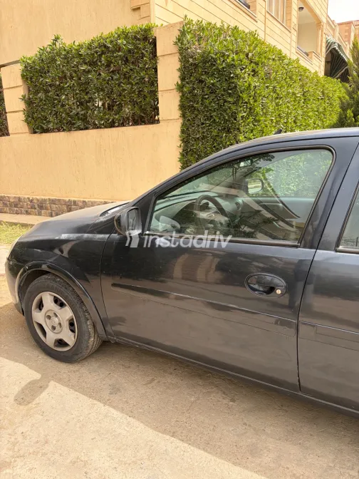 اوبل كورسا 2006 أبيض مستعملة للبيع - 5