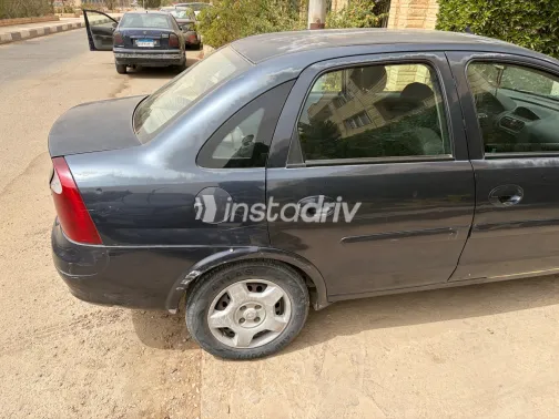 اوبل كورسا 2006 أبيض مستعملة للبيع - 10