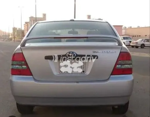 تويوتا كورولا 2004 أبيض مستعملة للبيع - 2