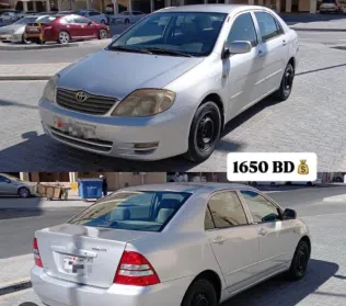 تويوتا كورولا 2004 أبيض مستعملة للبيع