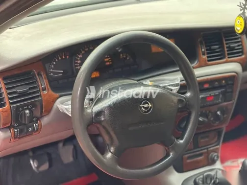 اوبل فيكترا 1998 أبيض مستعملة للبيع - 10