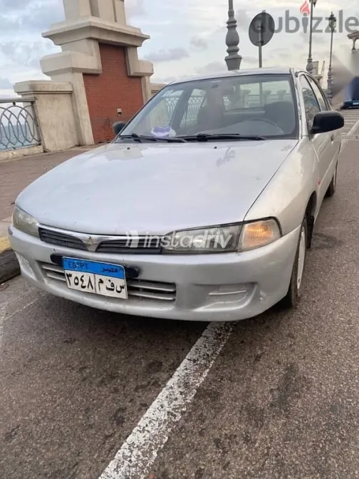 ميتسوبيشي لانسر 1998 فضي مستعملة للبيع - 2