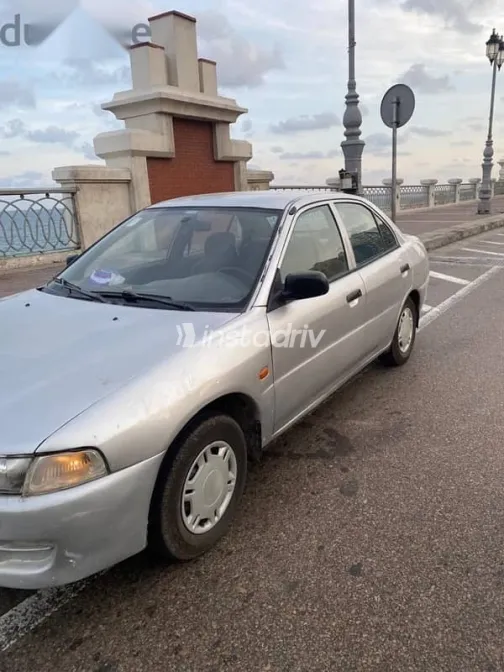 ميتسوبيشي لانسر 1998 فضي مستعملة للبيع - 4