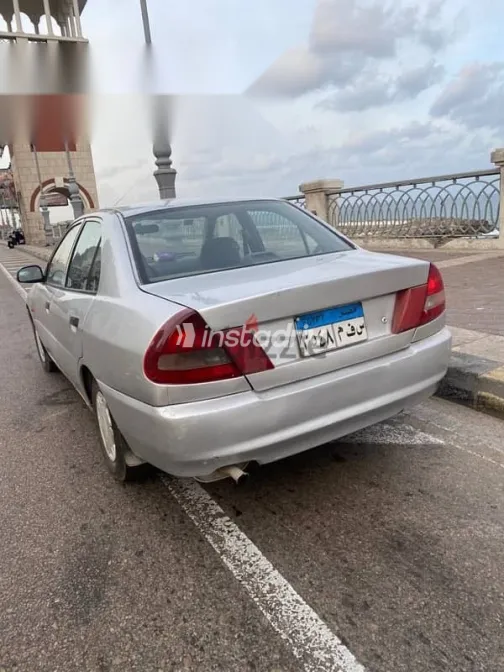 ميتسوبيشي لانسر 1998 فضي مستعملة للبيع - 5