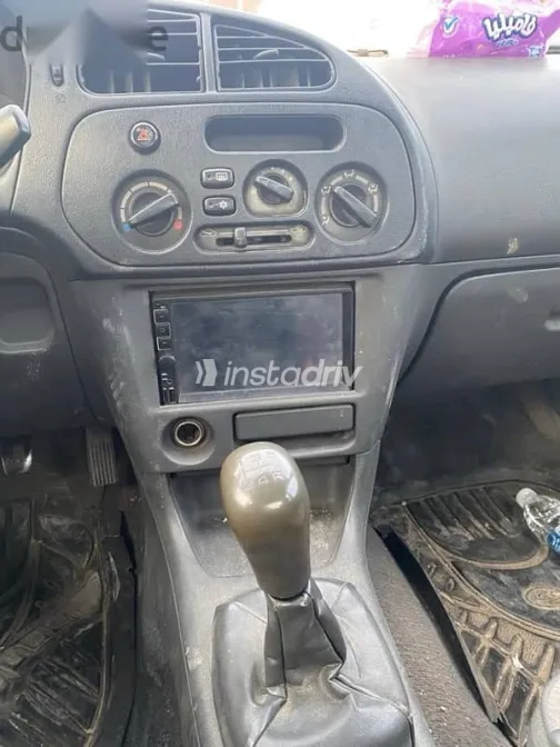 ميتسوبيشي لانسر 1998 فضي مستعملة للبيع - 7