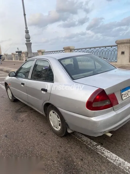 ميتسوبيشي لانسر 1998 فضي مستعملة للبيع - 9