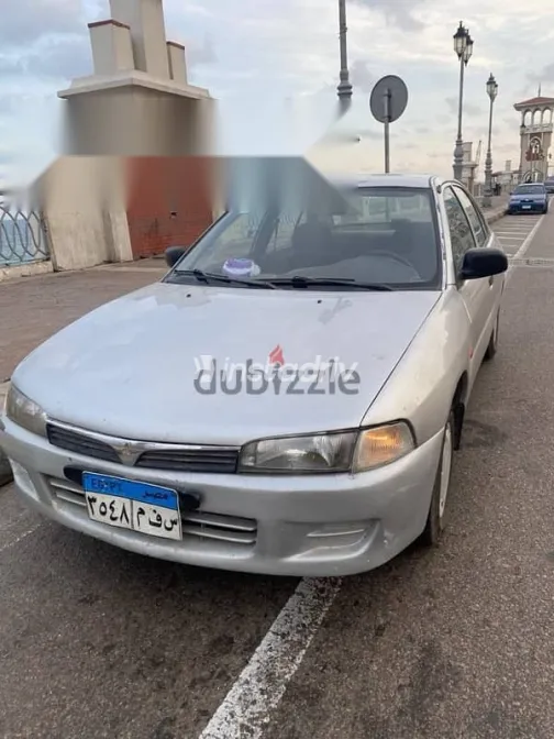 ميتسوبيشي لانسر 1998 فضي مستعملة للبيع - 10