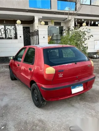 فيات باليو 2006 أحمر مستعملة للبيع