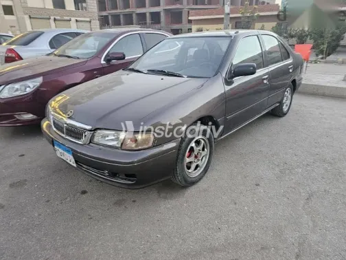 نيسان صنى 1999 رمادي مستعملة للبيع - 2