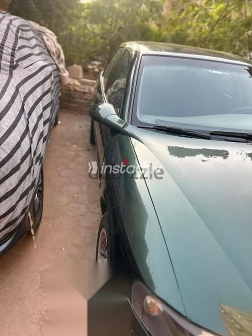 اوبل فيكترا 1999 أخضر مستعملة للبيع - 1