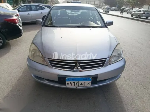 ميتسوبيشي لانسر 2013 فضي مستعملة للبيع - 1