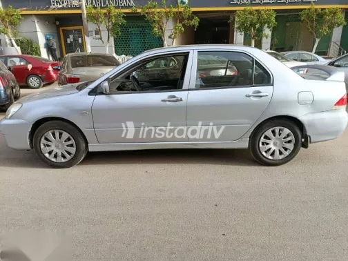 ميتسوبيشي لانسر 2013 فضي مستعملة للبيع - 3