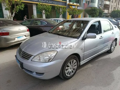 ميتسوبيشي لانسر 2013 فضي مستعملة للبيع - 4