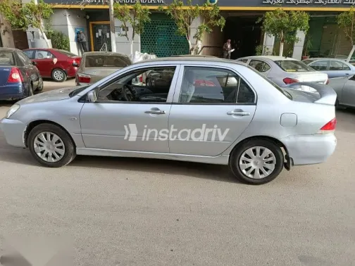 ميتسوبيشي لانسر 2013 فضي مستعملة للبيع - 5