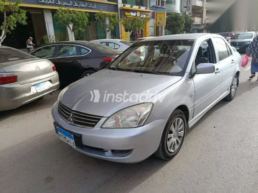 ميتسوبيشي لانسر 2013 فضي مستعملة للبيع - 6