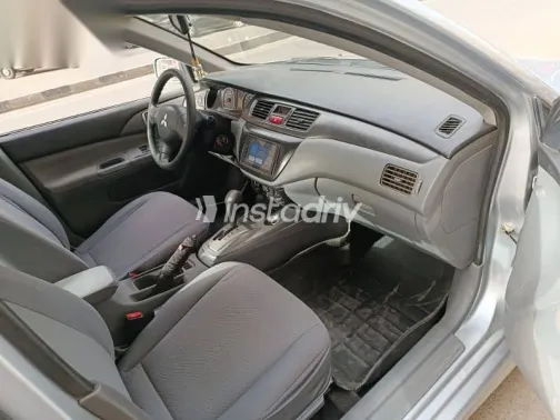 ميتسوبيشي لانسر 2013 فضي مستعملة للبيع - 8