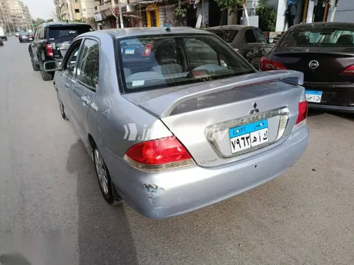 ميتسوبيشي لانسر 2013 فضي مستعملة للبيع - 9